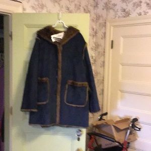 Woman’s clothing. Plus size 1X and 2X Winter coat, dressers, etc.